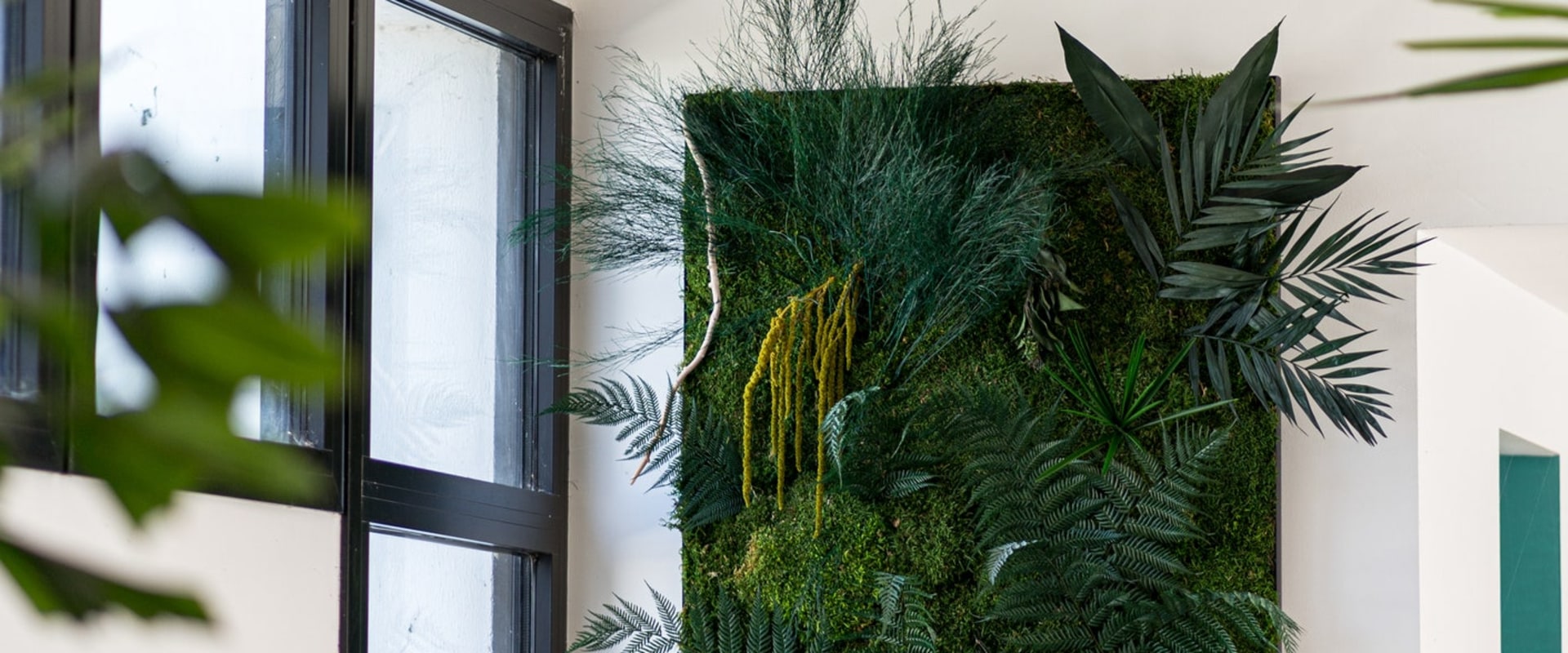 Adding Greenery to Public Spaces: Tips for Incorporating Moss Walls and Vertical Gardens